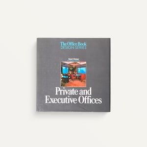 May include: A hardcover book titled "Private and Executive Offices" from The Office Book Design Series. The cover is gray with white and teal text. A photo of an office interior is in the center.
