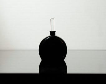 vintage glossy black art deco glassblown skincare perfume bottle