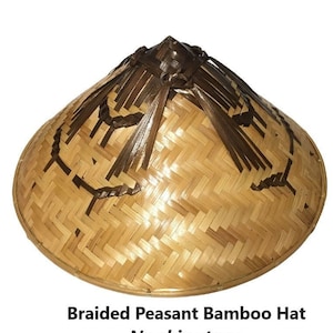 May include: A woven bamboo hat with a conical shape and a braided design. The hat is made of natural materials and has a light brown color.