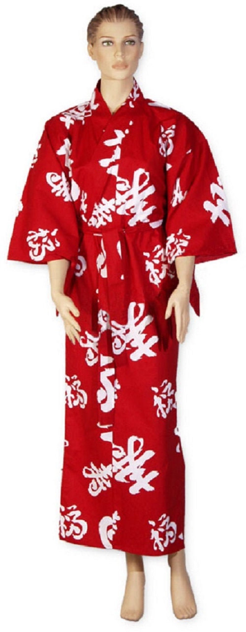 May include: A red and white Japanese-style robe with white kanji characters printed on it. The robe is tied at the waist with a matching sash.