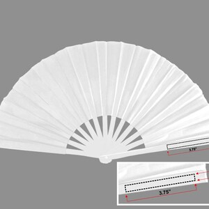 May include: A white, open hand fan with a pleated design. The fan is 9.5 cm long and 1.6 cm wide when closed. The fan's handle has a series of pointed, triangular cutouts.