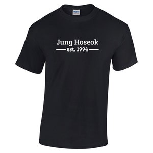 May include: Black t-shirt with white text that reads "Jung Hoseok - est. 1994".