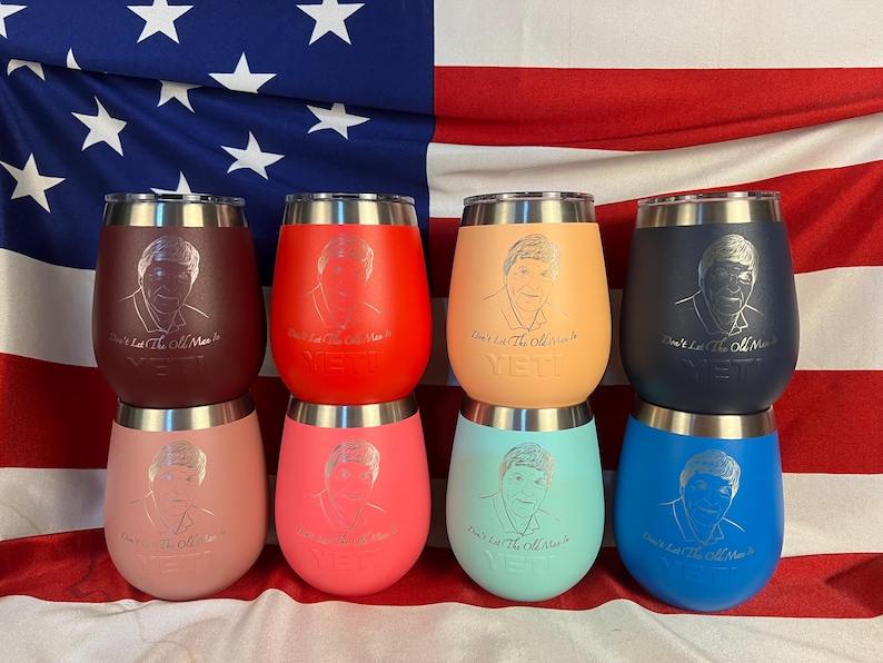 May include: Set of eight stainless steel wine tumblers in a variety of colours, including red, pink, blue, and peach. Each tumbler features a silver inscription that reads "Don't Let The Old Man's"