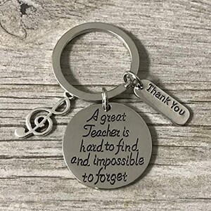 JewelryEveryday Treble Clef Charm Keychain with I Can Charm and Swivel Clasp Hook, Music Student, Teacher, or Musician Keychain