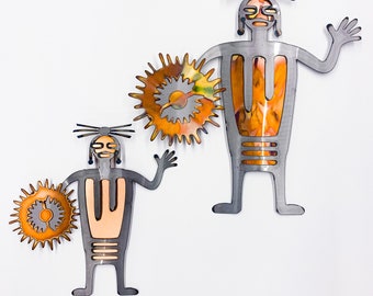 Harvest Man - Torch cut copper on steel wall hanging.