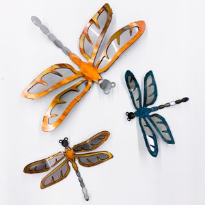 Dragonfly - Torch cut copper on steel wall hanging.