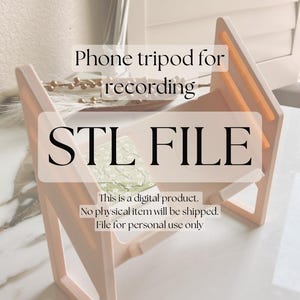 Puede incluir: Un trípode rosa para teléfono para grabar, con el texto "STL FILE" y las palabras "Este es un producto digital. No se enviará ningún artículo físico. Archivo para uso personal únicamente."