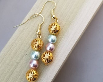 Bronze bead earrings with pink and blue accent sphere beads. Nickel free earwire earrings.