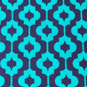May include: Teal and purple geometric fabric with a repeating pattern of interlocking ovals and diamonds.