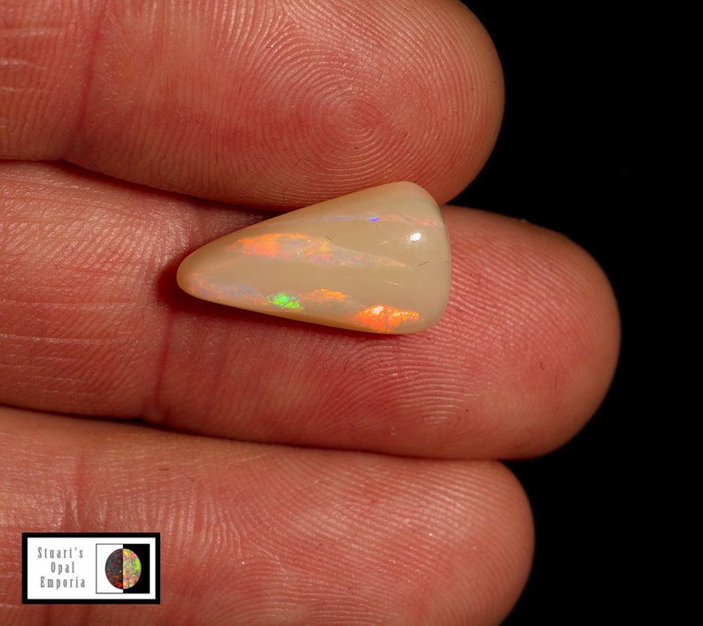 cabochon Australian Opal 5.05 carat Lambina caramel base opal with tiger fire lines