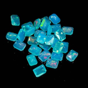 May include: A handmade wooden sign with the text "Welcome to our home" in a handwritten style. The sign is painted white with black lettering and a distressed finish, perfect for farmhouse decor.