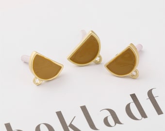 May include: Three gold-toned half-circle charms with a brown enamel finish. Each charm has a small loop for attaching to jewelry.