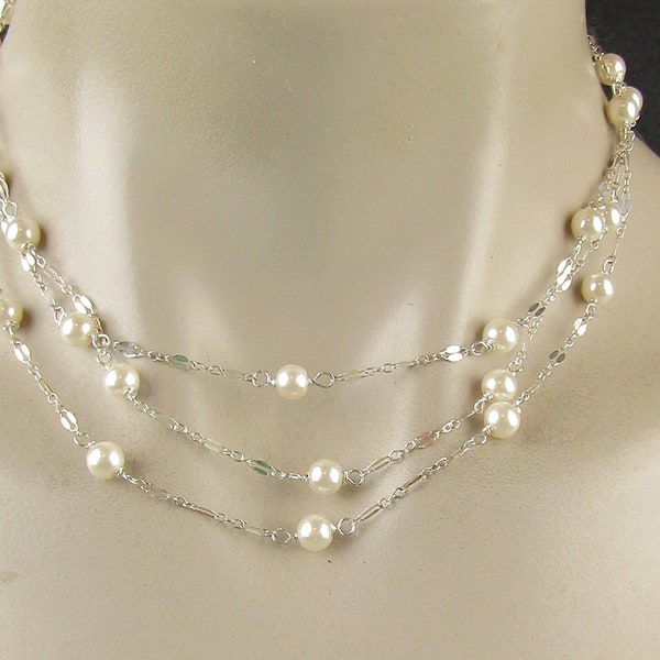 Long delicate  sterling silver and pearl necklace, the necklace is 50 inches long, Sterling silver strong magnetic clasp. Great gift!