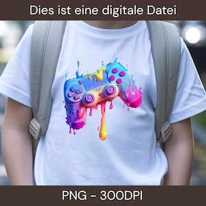 Könnte beinhalten: Weißes T-Shirt mit einem farbenfrohen, tropfenden Videospiel-Controller-Design. Der Controller ist in Blau-, Rosa-, Lila- und Gelbtönen gehalten. Der Text "Dies ist eine digitale Datei" steht oben und "PNG - 300DPI" unten.