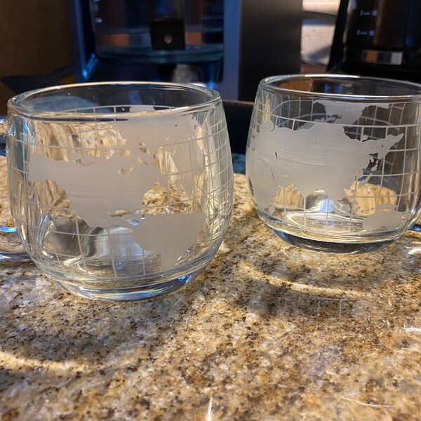 2 Nescafe World Globe Etched Glass Coffee Mugs - by Nestle