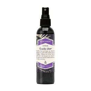 May include: A black spray bottle with a black cap. The label reads "ASTRO MAGIC JUPITER Lucky Star." Text on the label includes "Jupiter, help me make my dreams bigger..." and "Be the lucky star that makes all of my wishes come true."