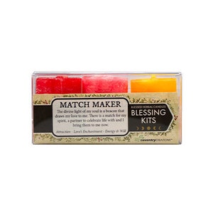 May include: A clear plastic box containing three small, square candles. The candles are red, pink, and yellow. The box has a label that reads "Match Maker Blessing Kits" with text about love and attraction.