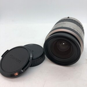 May include: A silver and black Canon EF 28-80mm f/3.5-5.6 lens with a black lens cap and a black Canon lens cap.