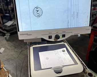 Lupa Merlin HD Enhanced Vision para ayudar con problemas de visión. Excelente estado, garantía de 90 días.