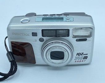 Pentax IQ Zoom 145M super 35mm compact camera very good  condition 90 day warranty