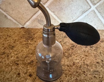 vintage nasal flush bottle with rubber squeeze bulb very cool
