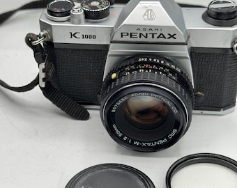 Pentax K1000 35 mm studentenfilmcamera met 50 mm lens uitstekende staat volledig professioneel onderhouden 90 dagen garantie