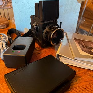 Rollei Rolleiflex SLX w/80mm planar lens/charger/manuals/box MINT 90 day warranty wow!
