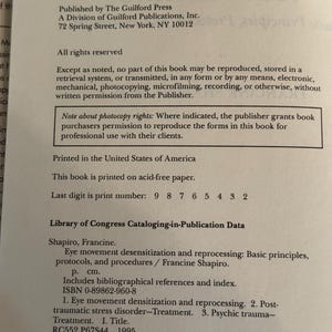 May include: A printed page from a book titled "Eye movement desensitization and reprocessing" by Francine Shapiro. The text includes publication information from The Guilford Press, copyright 1995, and Library of Congress data. The book is printed in the United States.