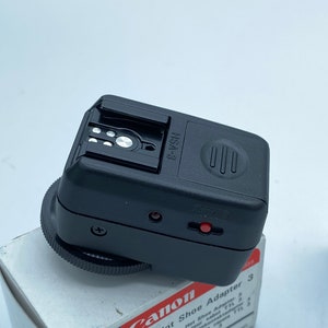 Canon TTL hot shoe adapter 3 new in box