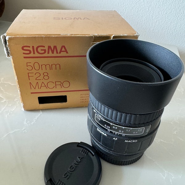 Minolta/Sony/Sigma 50mm f/2.8 macro autofocus lens new in box 90 day warranty!