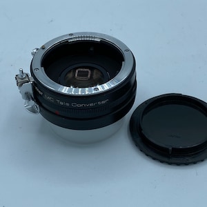 Unique Vivitar/Nikon 2X teleconverter AI or non AI lenses very cool.  90 day warranty.