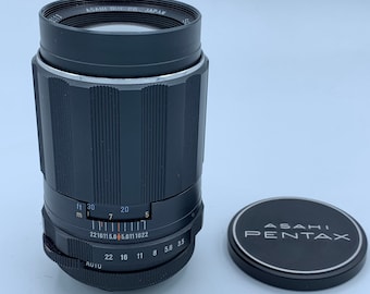 Pentax takumar 135mm f/3.5 m42 screw mount lens almost mint.