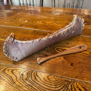 Very cool small 17” birch bark canoe and paddle