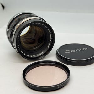 Canon FL 50mm f/1.4 II fast lens excellent plus 90 day warranty!