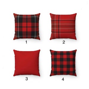 May include: Four square throw pillows in a variety of red and black plaid patterns. One pillow is solid red. The pillows are arranged in a 2x2 grid, showcasing different designs for home decor.