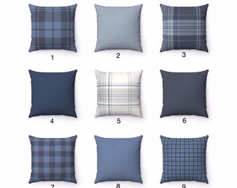 May include: Nine different blue and white plaid throw pillow designs. The pillows are arranged in a 3x3 grid. The pillows are all square and have a white background with blue and white plaid patterns.