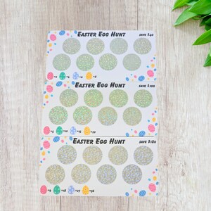 May include: Three white Easter Egg Hunt scratch-off cards with holographic circles. Each card has a different value to save, with colorful Easter egg and dot borders. The text "EASTER EGG HUNT" is printed at the top of each card.