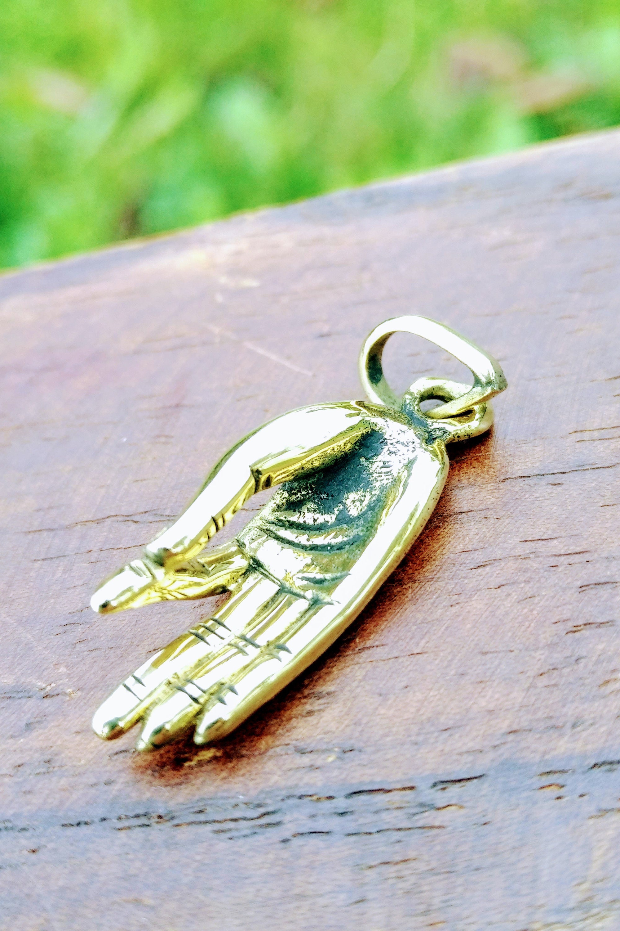 Buddha hand pendant deals
