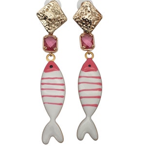 Dangle earrings with fish pendants and pink crystal. Made by hand.