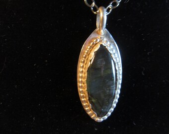 labradorite in silver pendant