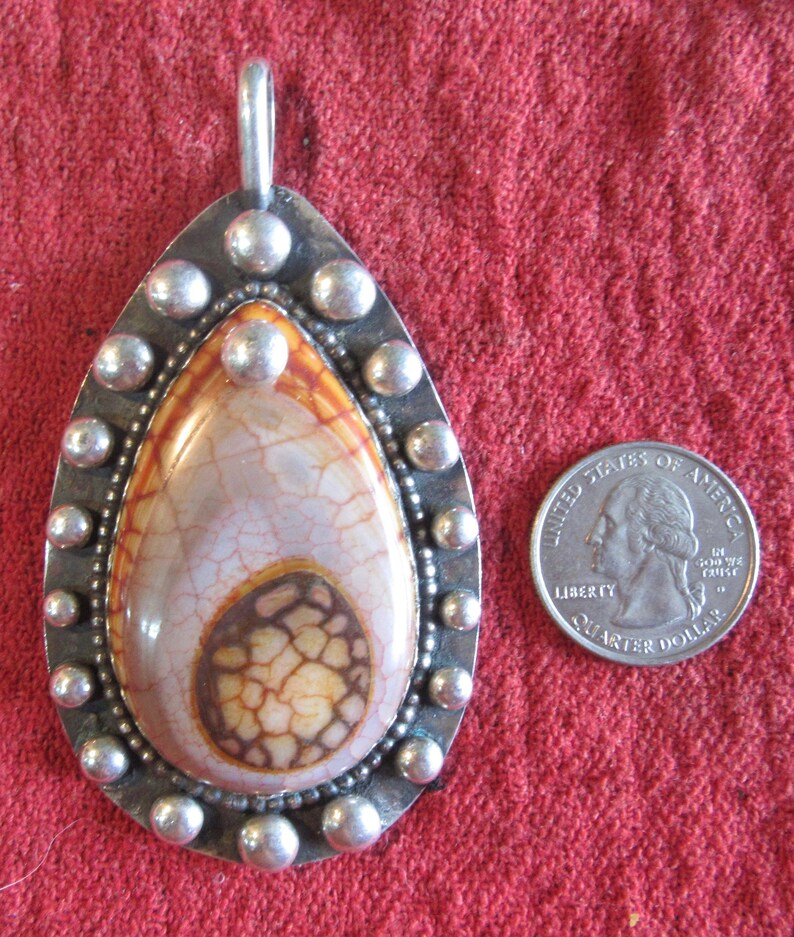 agate and silver pendant