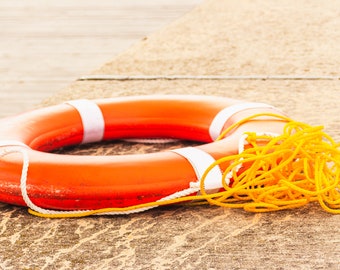 Orange Ring Buoy Life Preserver With Yellow Rope On Boat Dock, Nautical Image, Water Safety, Printable Digital Download