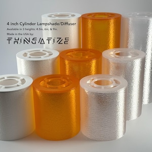 May include: A collection of cylinder lampshades and diffusers in white, orange, and clear. The lampshades are 4 inches in diameter and available in 4.5, 6, and 9-inch heights. The text "THINGATIZE" is visible.
