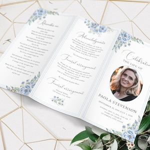 Puede incluir: Un programa de funeral azul y blanco con un diseño floral y una foto de una mujer. El programa incluye el nombre Paola Stevenson, las fechas 20 de septiembre de 2000 - 1 de julio de 2000, y el texto "Celebración, La vida de".