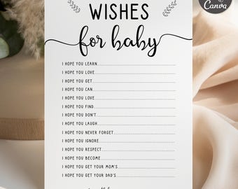 May include: A white card with the words "Wishes for baby" in black script. The card includes prompts like "I hope you learn" and "I hope you love." The Canva logo is in the upper right corner.