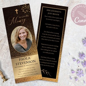 May include: A black and gold memorial bookmark featuring a photograph of a woman and the words "In Loving Memory" and "Her Journey's Just Begun". The bookmark also includes the name "Paola Stevenson" and the dates "September 20, 2000 - July 3, 2100".