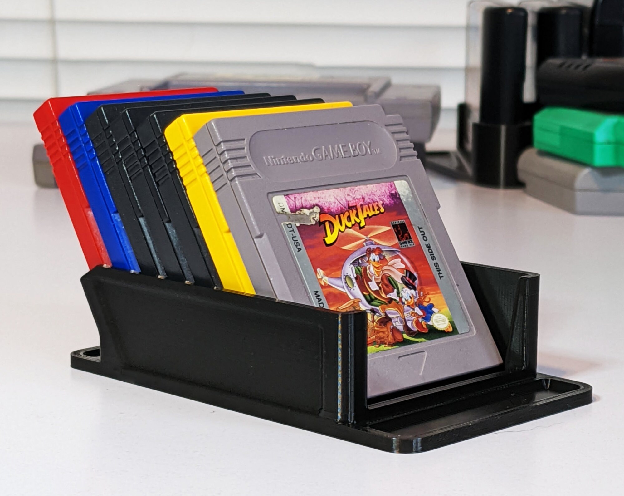 GAMEBOY ADVANCE STAND WITH 5X GAME CARTRIDGES HOLDER