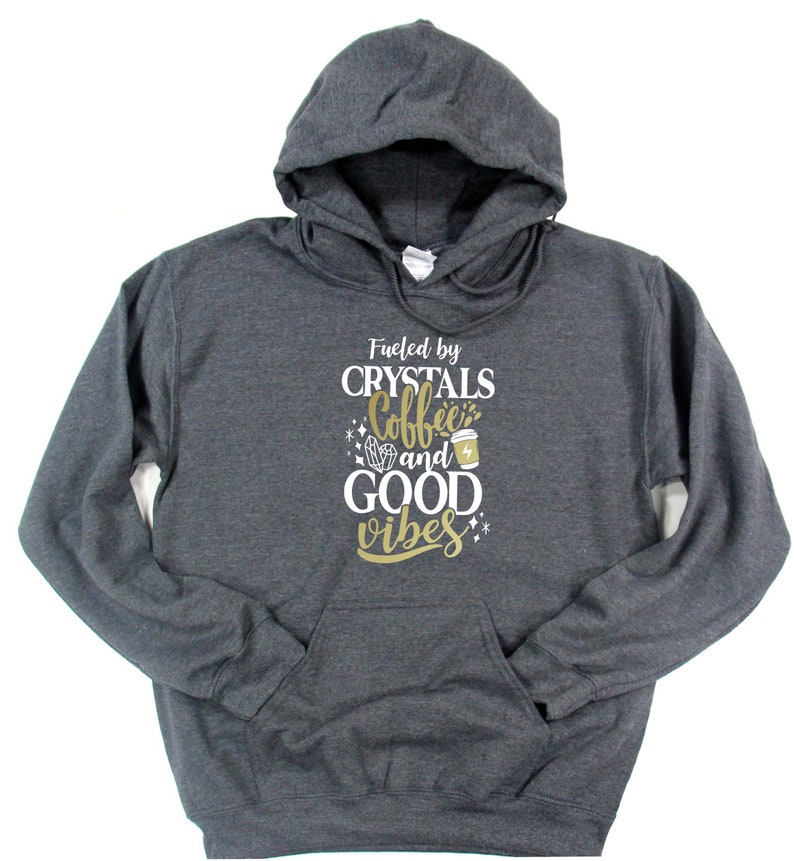 Crystal lover gift flat lay — women's cozy spiritual hoodie in black and gray, hand-pressed in Canada by Best Life Apparel