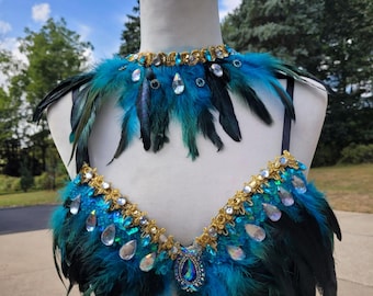A turquoise and gold feathered rave bra and choker, rhinestone embellished bra, rave bra