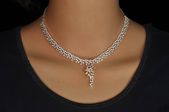 New model diamond best sale necklace